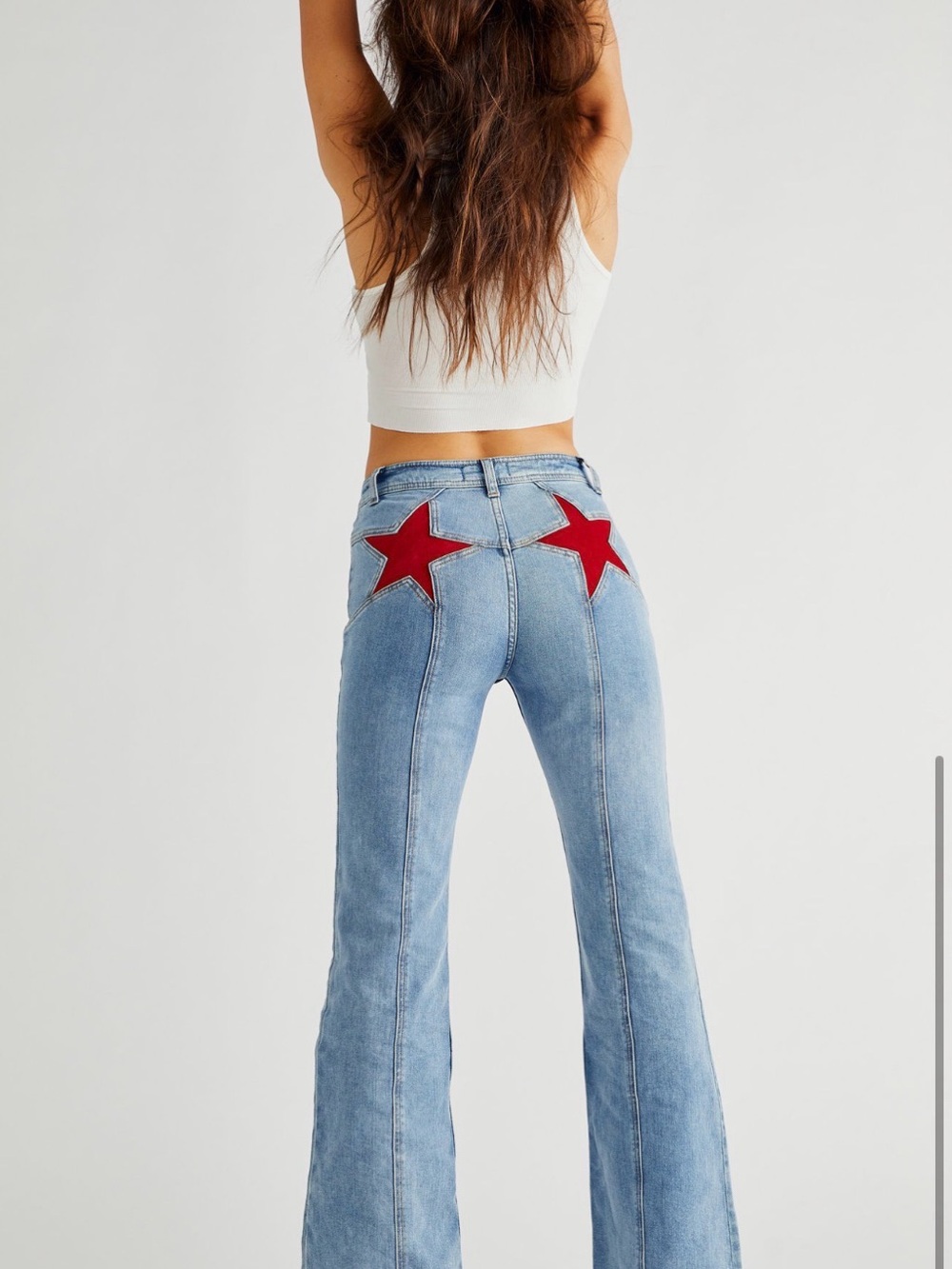 We The Free Light Blue Flare Jeans with Red Star Patches